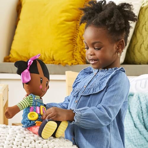 Playskool Dressy Kids Doll with Black Hair and Bow, Activity Plush Toy with Zipper, Shoelace, Button, for Ages 2 and Up (Amazon Exclusive)