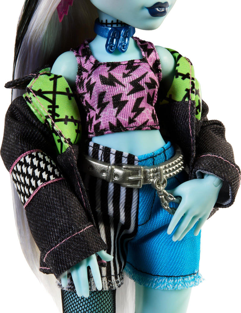 Monster High Frankie Stein Doll in Denim Jacket and Shorts, Includes Pet Dog Watzie and Accessories like a Backpack, Snack and Notebook, HXH73