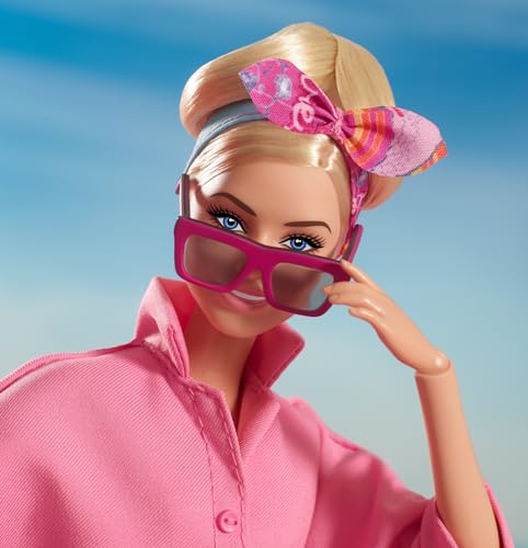 Barbie THE MOVIE, Margot Robbie as Barbie Doll from the movie, wearing pink jumpsuit, sunglasses and hairscarf, HRF29