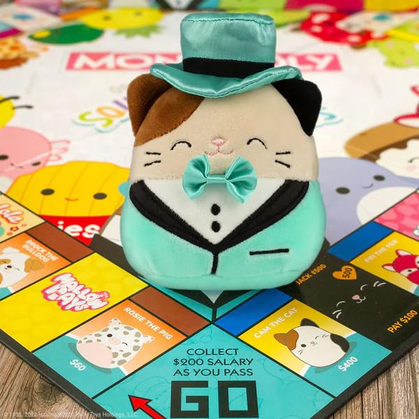 Winning Moves Squishmallows Monopoly Board Game Collectors Edition, Play with Fifi the Fox, Rosie the pig and Brock the Bulldog, includes an exclusive 4" Cam the Cat plush, great gift for ages 8 plus