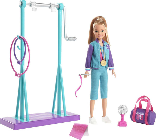 Barbie GBK59 Team Stacie Doll and Gymnastics Playset with Spinning Bar and 7 Themed Accessories, Multicoloured
