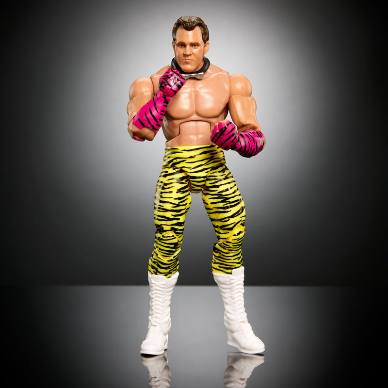 WWE Elite Action Figure & Accessories, 6-inch Collectible Brutus Beefcake with 25 Articulation Points, Life-Like Look & Swappable Hands, HTX26