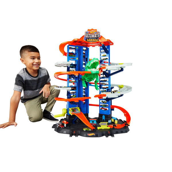 Hot Wheels City Ultimate Garage Playset with Multi-Level Racetrack, 91 cm Tall Moving T-Rex Dinosaur, Parks 100 Cars, Includes 2 Toy Cars, Toys for Ages 5 to 8, One Pack , GJL14